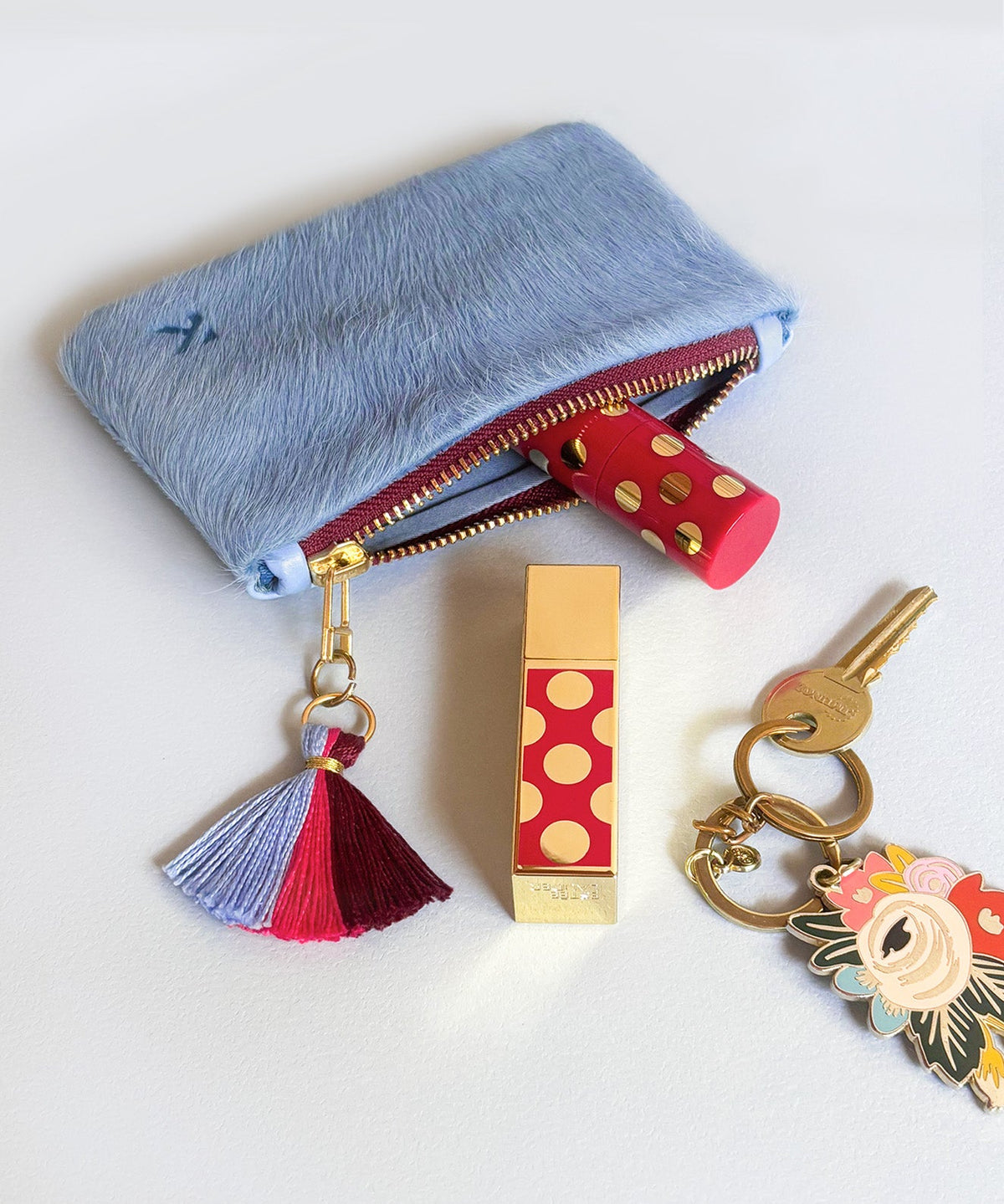 Monedero Aura Blue Kaloskopic con maquillaje y llaves accesorio de viaje cuero pelo corto azul claro