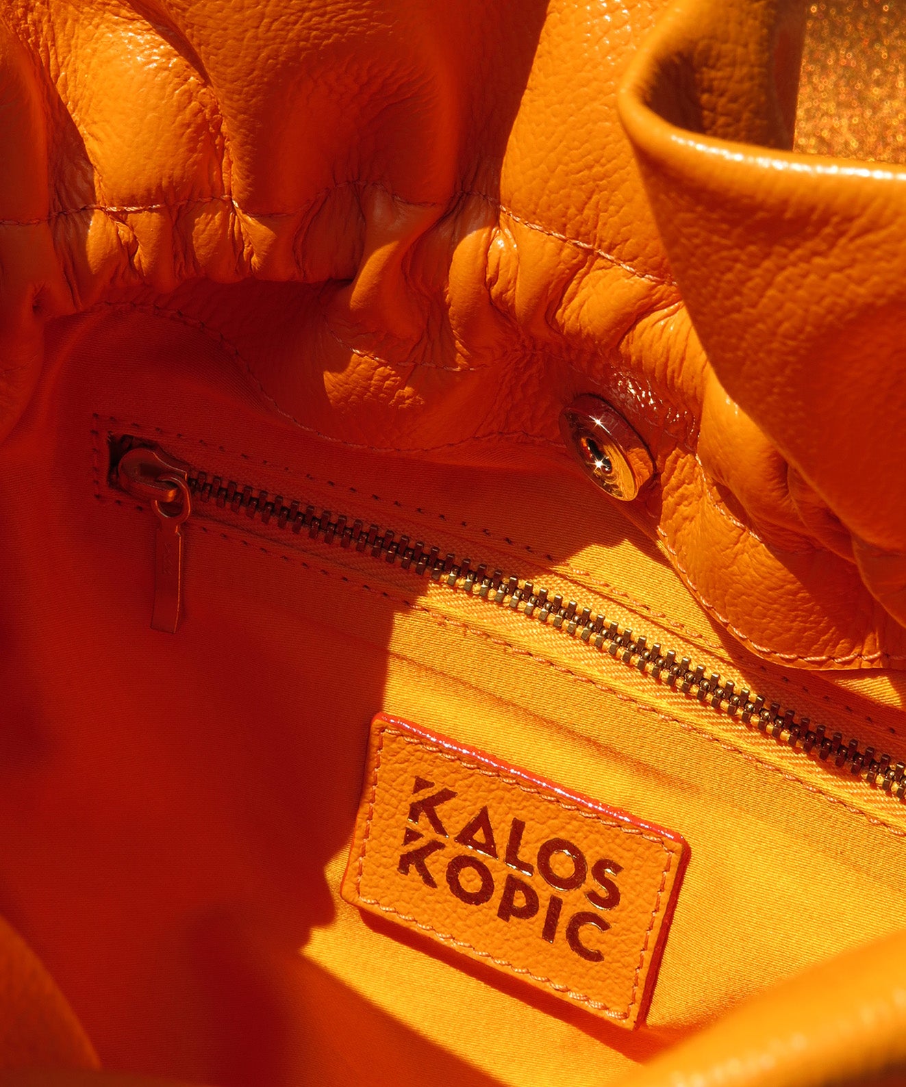 SUNSET RUFFLE BAG CARTERA BUCKET EN CUERO NARANJA