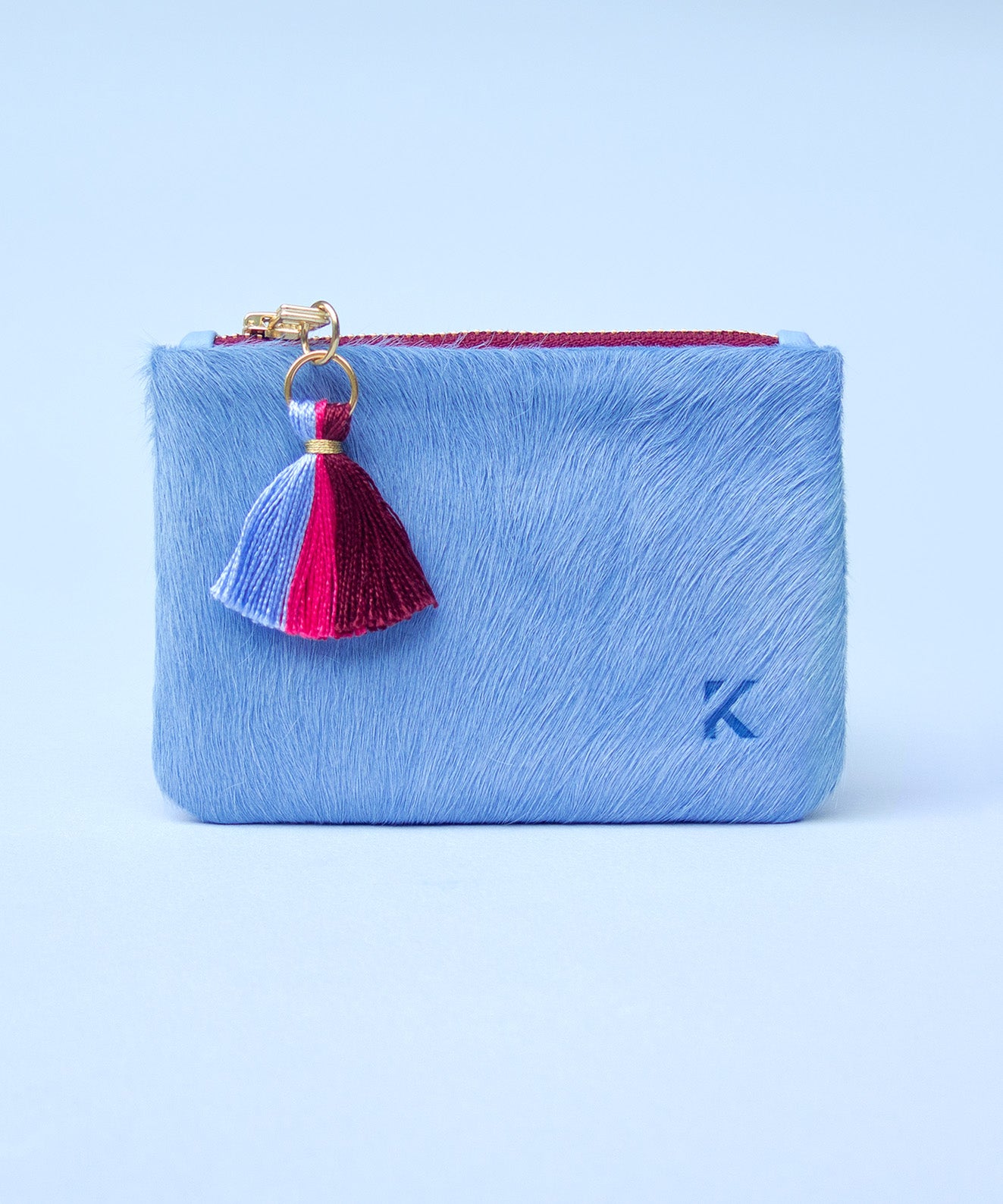 Monedero Aura Blue Kaloskopic en cuero pelo azul claro herrajes dorados